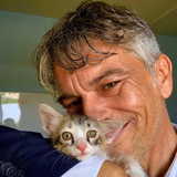 Paolo Gemma holding her adorable kitten