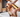 Person washing a Nova Scotia Duck Tolling Retriever in a bathtub