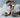 Couple cuddling with Bull Terrier and Abyssinian cat