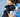 Veterinarian hugging a happy border collie dog