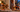 Golden retriever by a Halloween-decorated front door as a child in a witch costume holds a pumpkin