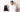 Confused man with glasses and black pug dog
