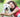 Happy woman hugging her white Labrador Retriever dog outdoors.
