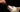 Person administering CBD oil to a White Swiss Shepherd dog.