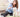 Woman grooming her fluffy white Maltese dog at home